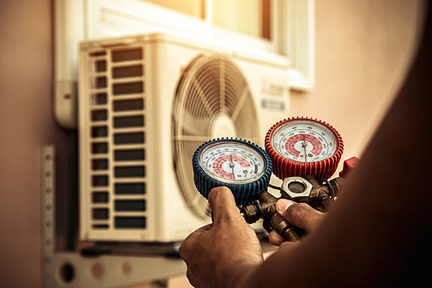 Professional Hvac technician working in Center Point, NM